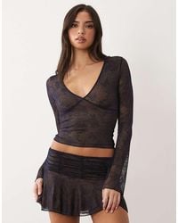 I.AM.GIA - Yvette V Neck Butterfly Pattern Lace Logo Flare Sleeve Top Co-ord - Lyst