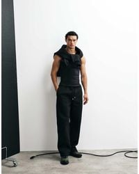 ASOS - Joggers Negros De Pernera Ancha Con Bordados De Tejido Efecto Neopreno - Lyst