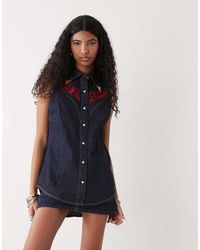Wrangler - X Lainey Wilson Embroidered Sleeveless Denim Shirt - Lyst