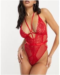 Ann Summers - Obsession Lace And Fishnet Plunge Front Bodysuit With Strapping Detail - Lyst