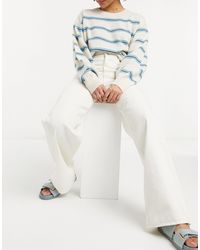 Monki Vaqueros color crudo con pernera ancha - Blanco