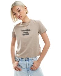 Calvin Klein - T-Shirt Mini Color Talpa Slavato Con Logo - Lyst