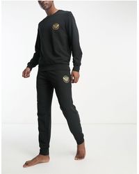 Emporio Armani - Bodywear - Loungset Met Sweater En joggingbroek Met Gouden Logo - Lyst