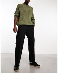 Cotton On - Pantalones cargo negros holgados con diseño - Lyst