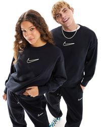 Nike - Felpa nera unisex con logo - Lyst