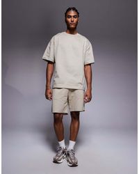 River Island - Conjunto Color Piedra De Pantalones Cortos Y Camiseta Con Diseño Estampado De -Neutro - Lyst