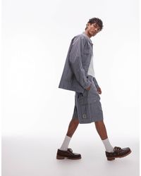 Carhartt - Notus - short à rayures - bleu - Lyst
