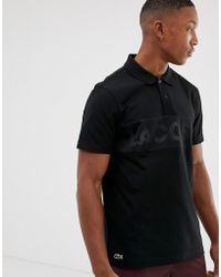 Lacoste Sport Polo en maille à grand logo - Noir