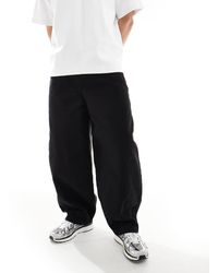 ASOS - Pantalones Negros Holgados Y Extragrandes De - Lyst
