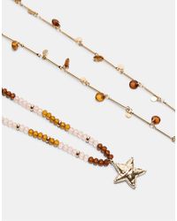 Stradivarius - Set Con 2 Collane Color Oro Con Perline E Stella - Lyst