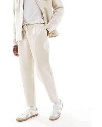 ASOS - Tapered Fit Fixed Hem joggers With Pleats - Lyst