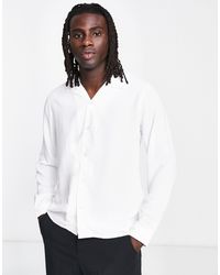 Heren Kleding voor voor Overhemden voor Casual en nette overhemden Bolongaro Trevor Slim Fit Overhemd Met Paisley Motief in het Zwart voor heren 