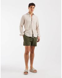 ASOS - Short oversize en jersey texturé effet hachuré - olive - Lyst