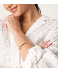 ASOS - Bracciale Rigido Placcato 14 K Con Dettaglio Attorcigliato - Lyst