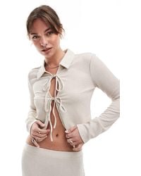 Vero Moda - Top Van Jersey Met Lange Mouwen En Gestrikte Voorkant - Lyst