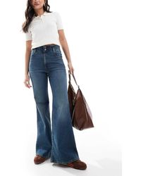Levi's - Vaqueros De Campana Medio De Talle Muy Alto Con Detalle Estilo Corsé Ribcage Bells De - Lyst