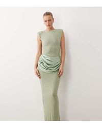 Wanderdoll - Eman Sleeveless Slash Neck Satin Drape Waist Detail Bodycon Maxi Dress - Lyst