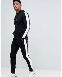 ASOS Tracksuit Muscle Hoodie/ Extreme Super Skinny sweatpants With White Side Stripe In Black