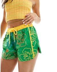 Labelrail - X Olivia Grace Herring Hibiscus Print Low Rise Shorts - Lyst