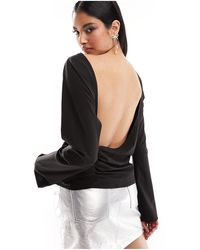 Weekday - Blusa negra con espalda escotada drapeada derya - Lyst