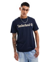Timberland - – es t-shirt mit großem camouflage-logo - Lyst