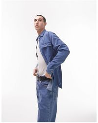 TOPMAN - Chemise en jean stretch à manches longues - moyen délavé - Lyst