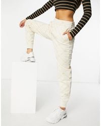 Lacoste Track pants and sweatpants for Women - Up to 49% off | Lyst