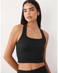 4505 - Seamless Ribbed Scoop Neck Cropped Tank Top With Racer Back - Lyst