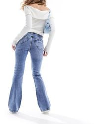 Miss Selfridge - Vaqueros De Campana Con Lavado Medio Y Bolsillos En Forma De Corazón De -Azul - Lyst