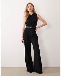 Mango - High Neck Sleeveless Jumpsuit With Statement Belt - Lyst
