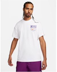 Nike - Camiseta blanca con estampado gráfico en la espalda y logo - Lyst
