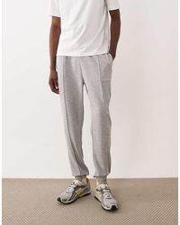 ASOS - Slim-Fit Joggingbroek Met Plat Gestikte Plooien - Lyst