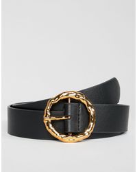 Cintura per vita e fianchi con fibbia a due cerchi decorati con perleASOS  in Denim di colore Nero | Lyst