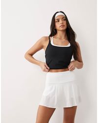 4505 - Active tennis - jupe fluide avec short intégré - Lyst