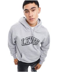 Levi's - Esclusiva x asos - felpa grigia con cappuccio e logo stile college - Lyst