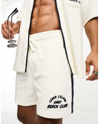 GANT - Pantalones cortos blancos y azul marino con diseño color block y logo deportivo - Lyst