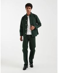 Lacoste - Overdyed Straight Leg Jeans - Lyst