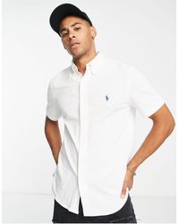 Polo Ralph Lauren - Camicia piqué slim bianca a maniche corte con logo - Lyst