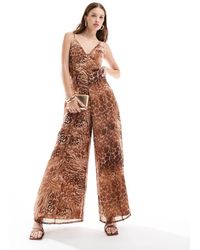 ASOS - Tuta Jumpsuit Con Stampa Leopardata, Scollo A V E Pannello Trasparente - Lyst