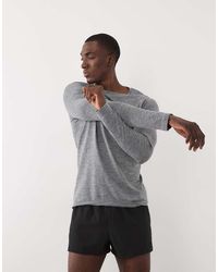 4505 - Naadloze Lichtgewicht Slim-Fit Basislaagtop Met Lange Mouwen - Lyst