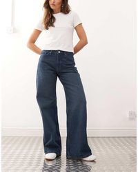 Weekday - Vaqueros De Talle Medio Y Pernera Ancha Con Lavado Azul Paz De - Lyst