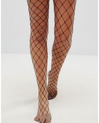 ASOS Collants à maille résille oversize - Noir