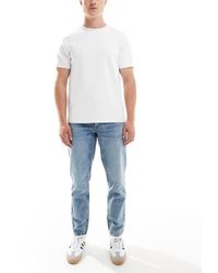 ASOS - Tapered Fit Jeans - Lyst
