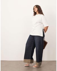 ARRANGE - Curve - parker - jean souple à taille haute et ourlet retroussé - indigo - Lyst