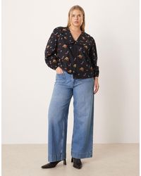 ASOS - Asos Design Curve High Waist Wide Leg Jeans With Front Pockets - Lyst