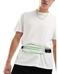 Nike - Riñonera Deportiva Verde Vapor Slim 3.0 De - Lyst