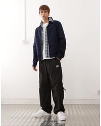 Umbro - – locker geschnittene jogginghose mit reißverschluss - Lyst