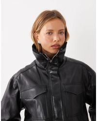 Mango - Funnel Neck Cinched Waist Faux Leather Jacket - Lyst