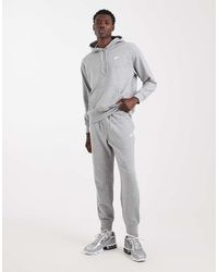 nike gingham check joggers in blue