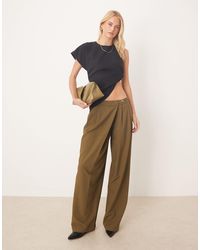 ASOS - Asos design tall - pantalon ample ajusté avec détail croisé asymétrique à boucle - kaki - Lyst